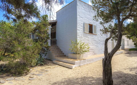 Es Pujols: Building, Daytime, Property, Plant, Window, Water, Azure, Infrastructure, Sky, Architecture