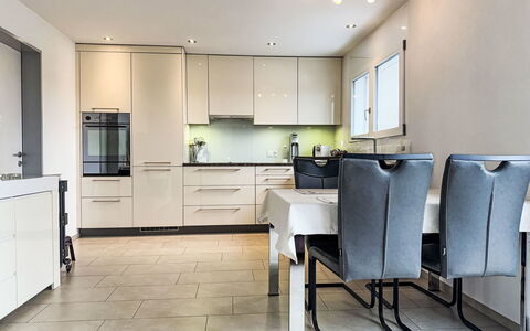 Luxenweid: Furniture, Interior Design, Flooring, Floor, Wood, Kitchen, Countertop, Chair, Ceiling, Cabinetry