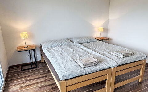 Luxenweid: Bed, Floor, Bedroom, Flooring, Bedding, Bed Sheet, Interior Design, Wood, Furniture, Wood Flooring