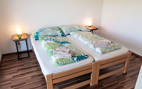 Luxenweid: Bedroom, Bed, Wood, Flooring, Bed Sheet, Floor, Bedding, Interior Design, Furniture, Bed Frame