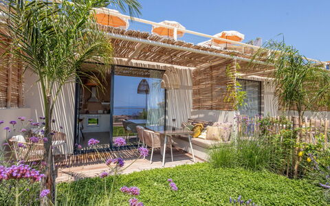 San Lorenzo al Mare 654: Plant, Building, Flower, Sky, Property, Furniture, Window, Botany, House, Chair