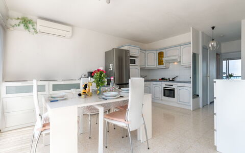 Le Beaupré: Table, Furniture, Chair, Cabinetry, Interior Design, Flooring, Floor, Building, Kitchen