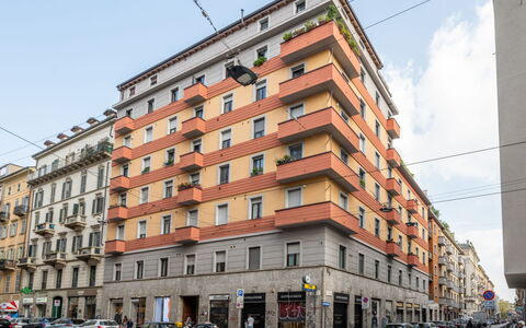 Corso Genova Apartment: Sky, Building, Daytime, Property, Wheel, Car, Cloud, Window, Infrastructure