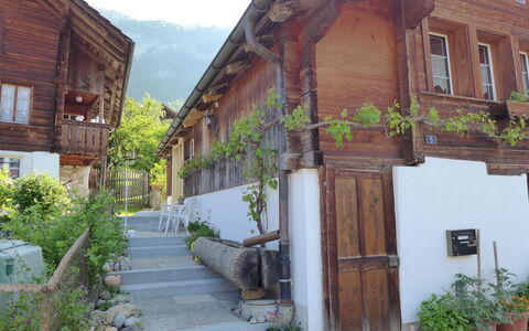 Brienzwiler 125: Door, Cottage, Flowerpot, Houseplant, Balcony, Hardwood, Porch, Siding, Mountain Village, Alley