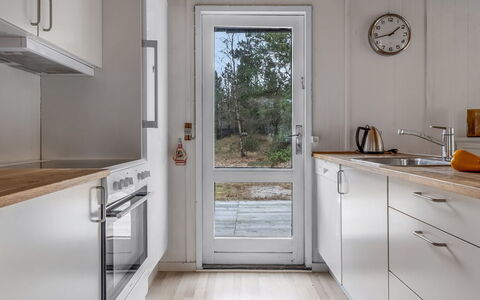Sofus - 500M from the Sea: Flooring, Countertop, Kitchen, Wood, Kitchen Appliance, Major Appliance, Floor, Interior Design, Cabinetry, Wood Flooring