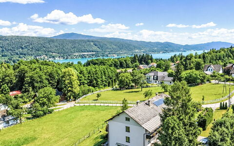 Velden am Wörthersee 37: Tree, Mountainous Landforms, Hill, Highland, Landscape, Human Settlement, Hill Station, Mountain Range, Valley, Lawn