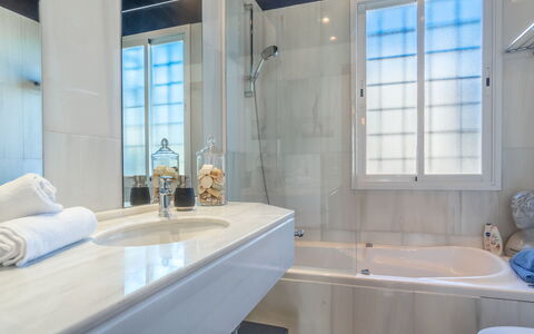 Vistamar: Bathtub, Tap, Mirror, Plumbing Fixture, Property, Sink, Azure, Bathroom, Bathroom Cabinet, Wood