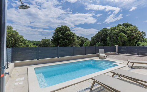 Villa Karlo: Water, Building, Plant, Tree, Window, Swimming Pool, Urban Design, Condominium, Leisure, Real Estate