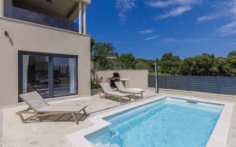 Villa Karlo: Water, Building, Plant, Tree, Window, Swimming Pool, Urban Design, Condominium, Leisure, Real Estate