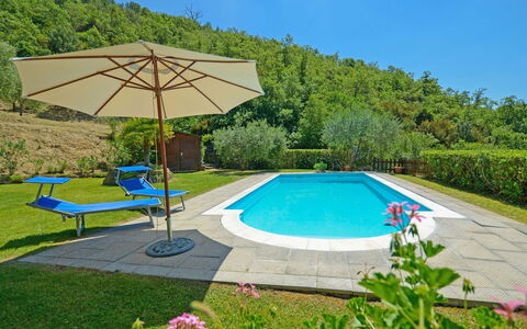 Il Farinaio: Table, Sky, Furniture, Tableware, Building, Interior Design, Outdoor Furniture, Porch, Shade, Chair