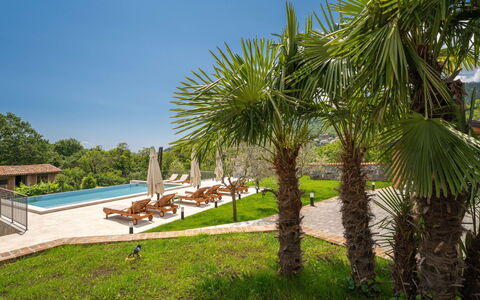 Mila: Water, Plant, Building, Daytime, Property, Swimming Pool, Window, Sky, Azure, Nature