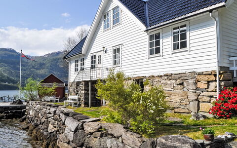 Ørviksnes: Plant, Building, Water, Property, Window, House, Sky, Cloud, Wood, Architecture