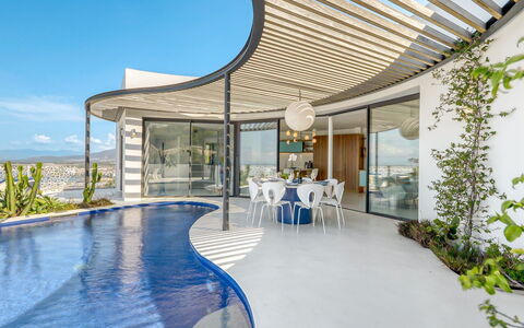 Donut: Water, Sky, Building, Property, Tableware, Window, Seaside Resort, Azure, Table, Architecture