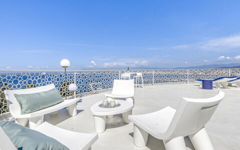 Donut: Water, Sky, Building, Property, Tableware, Window, Seaside Resort, Azure, Table, Architecture
