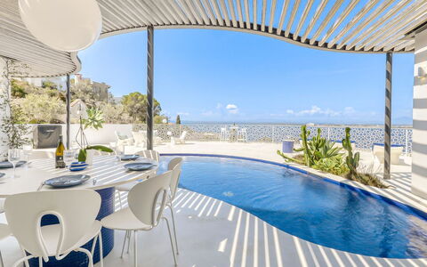 Donut: Water, Sky, Building, Property, Tableware, Window, Seaside Resort, Azure, Table, Architecture