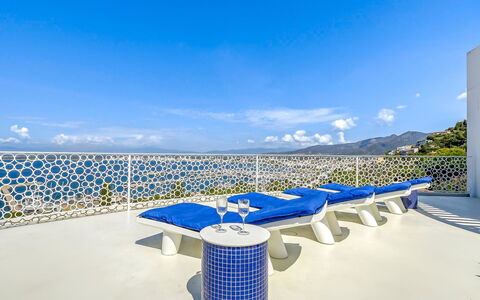 Donut: Water, Sky, Building, Property, Tableware, Window, Seaside Resort, Azure, Table, Architecture