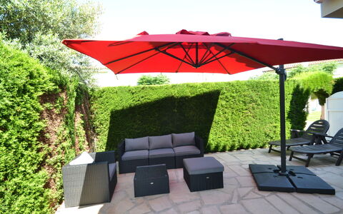 Villa Mallorca: Plant, Green, Shade, Botany, Sky, Umbrella, Grass, Outdoor Furniture, Shrub, Landscape