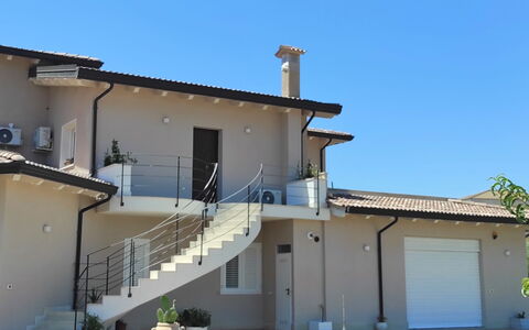 Amici Miei di Levante: Home, House, Residential Area, Roof, Door, Balcony, Estate, Shade, Villa, Paint