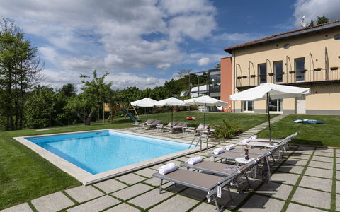 Casa San Grato - Roero - Langhe, Piemonte: Cloud, Water, Sky, Plant, Building, Swimming Pool, Shade, Outdoor Furniture, Window, Leisure