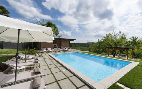 Casa San Grato - Roero - Langhe, Piemonte: Sky, Cloud, Plant, Property, Water, Swimming Pool, Azure, Shade, Outdoor Furniture, Leisure