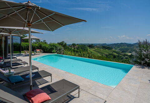 Relais Casa Clara - Roero - Langhe, Piemonte: Blue, Swimming Pool, Resort, Outdoor Furniture, Sunlounger, Eco Hotel, Landscaping, Shade, Chair, Umbrella