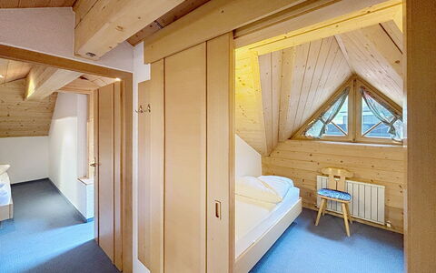 Ischgl 111: Wood, Ceiling, Interior Design, Bedroom, Attic, Hardwood, Wood Stain, Bed, Bedding, Log Cabin