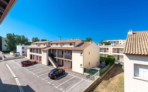 Les Huniers: Sky, Building, Window, Property, Plant, Wheel, Car, Vehicle, Blue