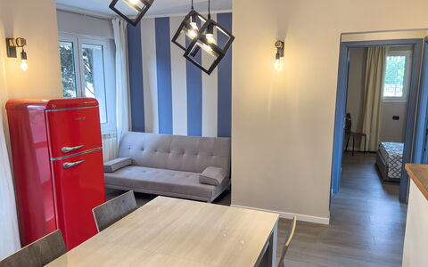 Apartment Tre - Diano Marina: Furniture, Building, Table, Blue, Comfort, Wood, Couch, Living Room, Interior Design, Flooring