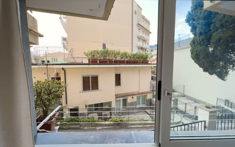 Apartment Tre - Diano Marina: Plant, Sky, Window, Building, Architecture, Shade, Urban Design, Rectangle, Facade