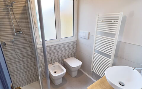 Apartment Tre - Diano Marina: Plumbing Fixture, Sink, Bathroom Sink, Bathroom, Interior Design, Floor, Toilet, Flooring, Wood