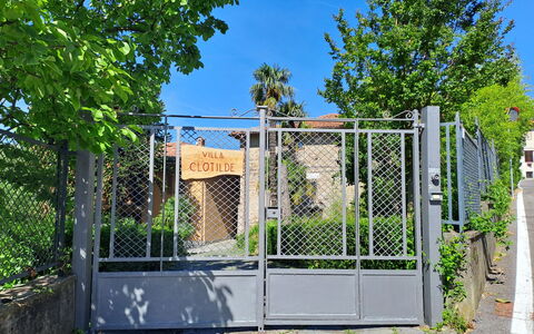 Clotilde: Plant, Sky, Tree, Road Surface, Fence, Land Lot, Building, Home Fencing, House, Facade