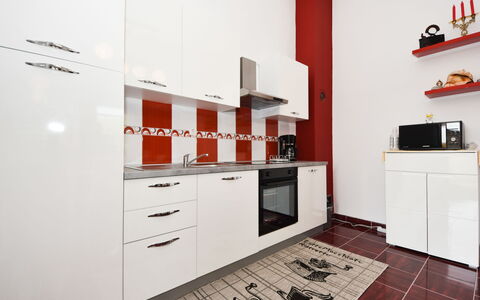 Zalazak Sunca: Cabinetry, Furniture, Building, Countertop, Interior Design, Drawer, Lighting, Wood, Floor, Shelving
