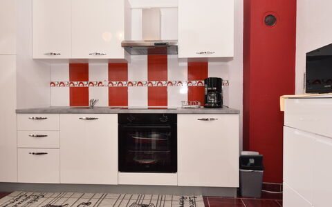 Zalazak Sunca: Cabinetry, Building, Countertop, Kitchen Appliance, Wood, Kitchen Stove, Flooring, Interior Design, Kitchen, Floor