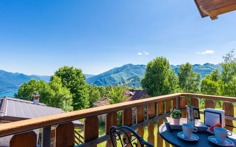 Roby: Furniture, Table, Sky, Chair, Wood, Interior Design, Tree, Floor, Shade, Building