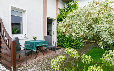Tauber: Plant, Property, Window, Building, Shade, Land Lot, Grass, Flower, Chair, Landscape