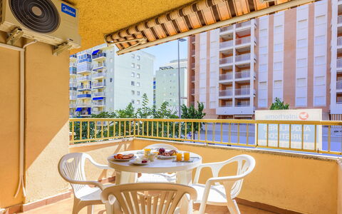 Oropesa del Mar 649: Flower, Plant, Furniture, Property, Window, Building, Green, Chair, Table, Sky