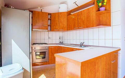 Villa Jolie Amazing Stone: Kitchen, Kitchen Appliance, Countertop, Flooring, Major Appliance, Wood, Cabinetry, Floor, Interior Design, Room