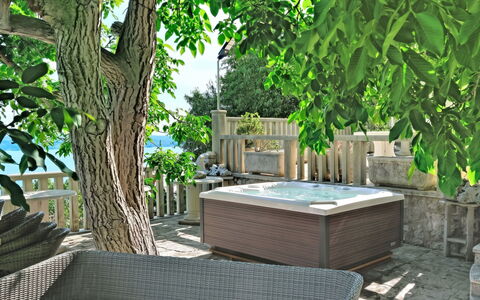 Villa Jolie Amazing Stone: Furniture, Outdoor Furniture, Chair, Shade, Deck, Bathtub, Garden, Resort, Patio