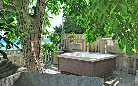 Villa Jolie Amazing Stone: Furniture, Outdoor Furniture, Chair, Bathtub, Shade, Deck, Garden, Patio, Resort