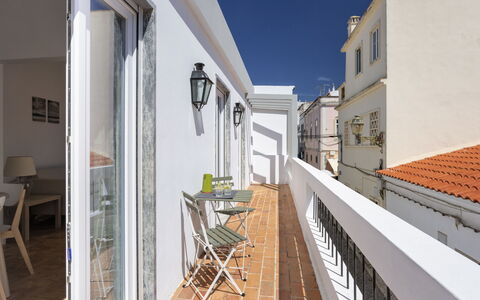 Dona Meia Praia: Flower, Plant, Furniture, Property, Window, Building, Green, Chair, Table, Sky