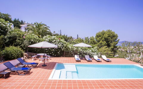 Casa la Torre: Water, Table, Sky, Cloud, Furniture, Plant, Property, Chair, Azure, Outdoor Table