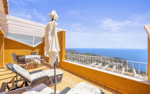 Las Brisas: Water, Table, Sky, Cloud, Furniture, Plant, Property, Chair, Azure, Outdoor Table