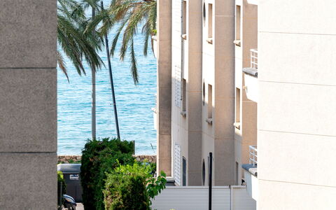 Waves: Cloud, Sky, Daytime, Property, Water, Building, Plant, Azure, Urban Design, Public Space