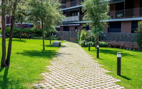 Waves: Cloud, Sky, Daytime, Property, Water, Building, Plant, Azure, Urban Design, Public Space