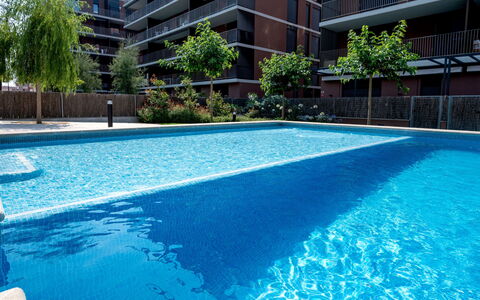 Waves: Cloud, Sky, Daytime, Property, Water, Building, Plant, Azure, Urban Design, Public Space