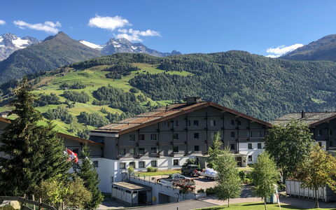 Disentis 105: Water, Cloud, Sky, Building, Plant, Window, Swimming Pool, Tree, House, Leisure