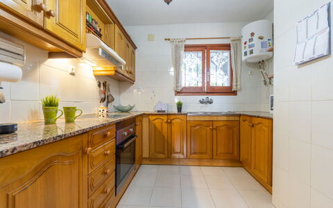 Llimona: Cabinetry, Property, Countertop, Window, Wood, Kitchen Sink, Lighting, Sink, Interior Design, Kitchen