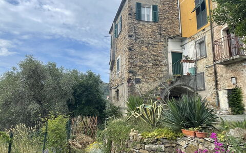 Casa Ferrando: Plant, Sky, Building, Cloud, Window, Vegetation, House, Tree, Residential Area, Natural Landscape