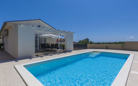 Noce: Water, Sky, Building, Property, Swimming Pool, Azure, Shade, Rectangle, House, Outdoor Furniture