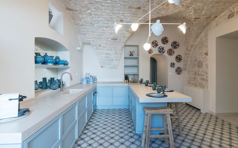 Dimora Cocchi: Table, Furniture, Property, Cabinetry, Azure, Tap, Interior Design, Lighting, Countertop, Shelf